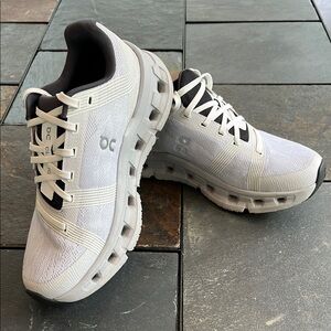 On Running White and Black Athletic Shoes-CloudGo
